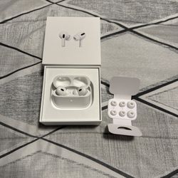 Apple AirPods Pro with charging case and extra ear tips. Great R3ps