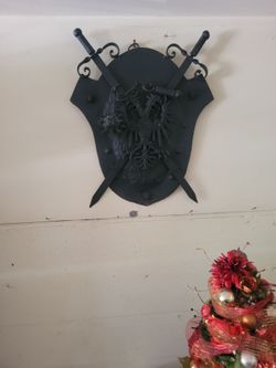 Steel sword plaque