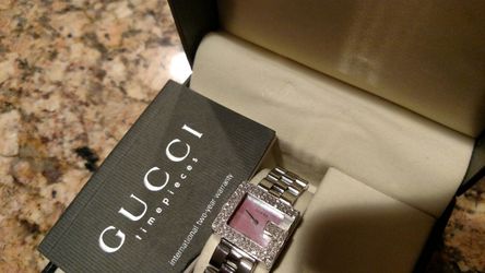 Womans vintage custom diamond bezel G watch.