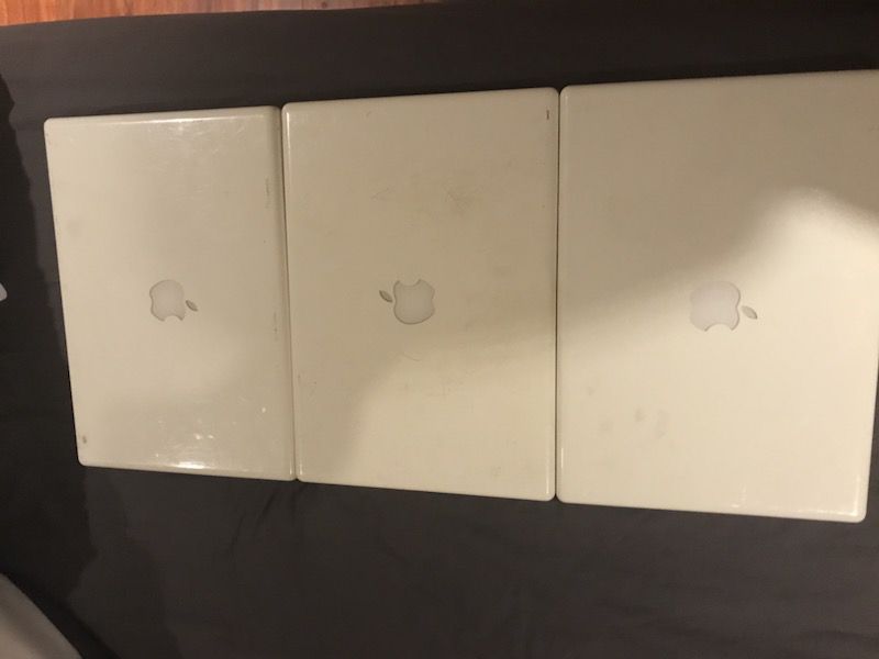 Three Apple laptops for parts