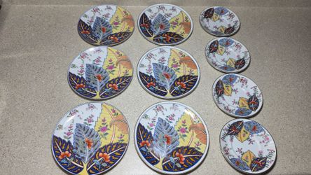 Set of 10 Seymour Mann  saled plates and saucers