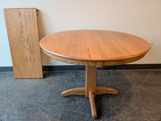 Round Pedestal Wood Dining Table