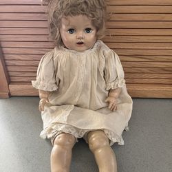 Antique P 200 Ideal baby doll-22”. Cry box still works. Original clothes.