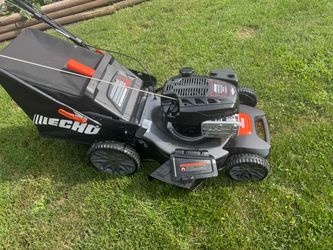 Echo Self Propelled Mower 190cc With 21” Cut. Bag, Side Chute. Like New