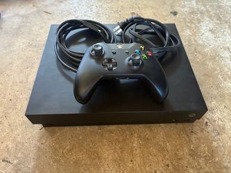 Microsoft Xbox One X Console with Controller