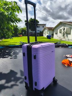 light purple hardshell spinner suitcase