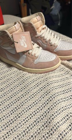 Pink and white Nikes