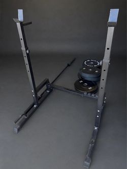 Squat Rack with Barbell and Weight Plates