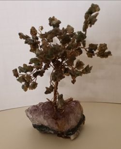 6" green stones in twisted copper wire tree on an amethyst base $10 FIRM
