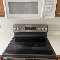 30 inch wide GE electric stove and microwave 