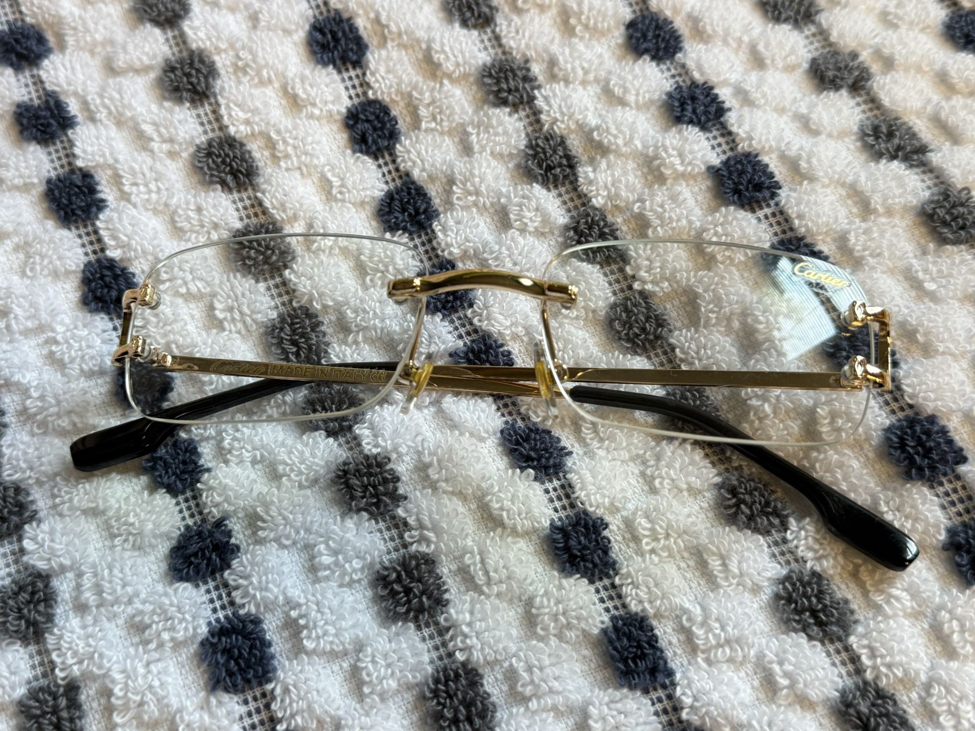 Cartier Gold and Black Rimless Eyewear