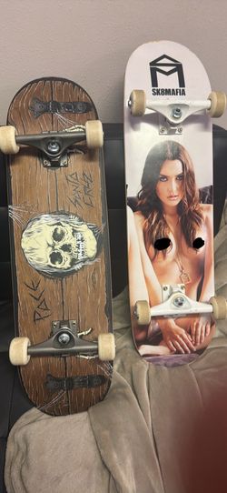 A Santa Cruz skateboard and just a random one