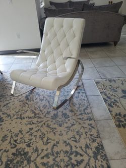 Two White Leather Chairs