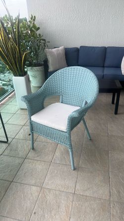 light blue whicker chair