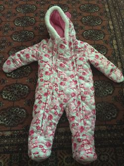 Baby snow suit and bag of other baby clothes and shoes