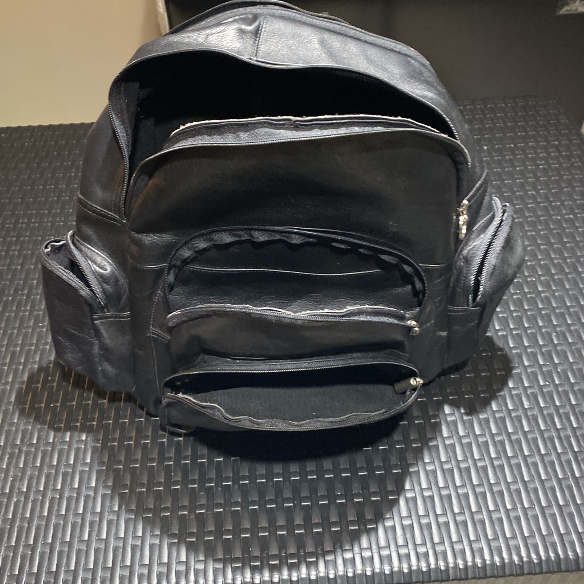 Genuine leather expandable knapsack $25