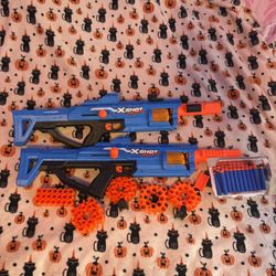 Two Nerf guns with bullets