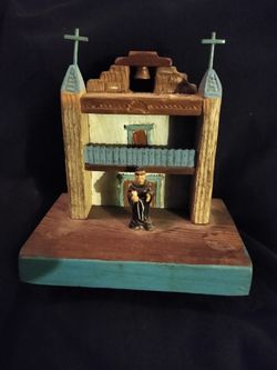 Homemade mini church with homie priest