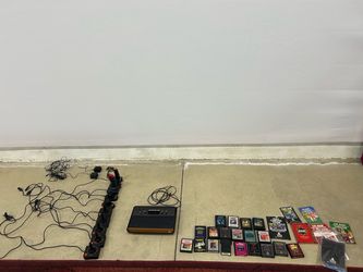 Genuine Atari 2600 Counsel Bundle + New & Used Controllers + 19 Games