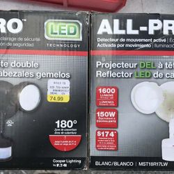 Motion Sensor Lights 1/2 Price Or Buy One Get One Free. One Is Black And One White 