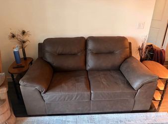 Brown love seat