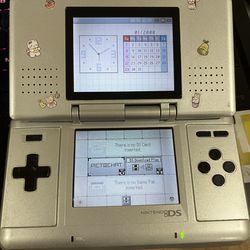 Silver Nintendo DS Phat - comes with charger