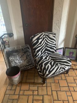 Zebra chair with matching Faux comforter/shams( full size) 2 Pictures and Garage Can.