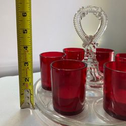 Beautiful candleholder set up. Vintage and modern glass mix. Can be used with carrier to set candles throughout the house or display altogether.