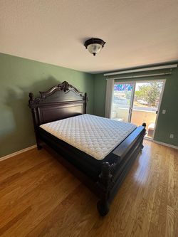 Free cal king bed frame- no mattress