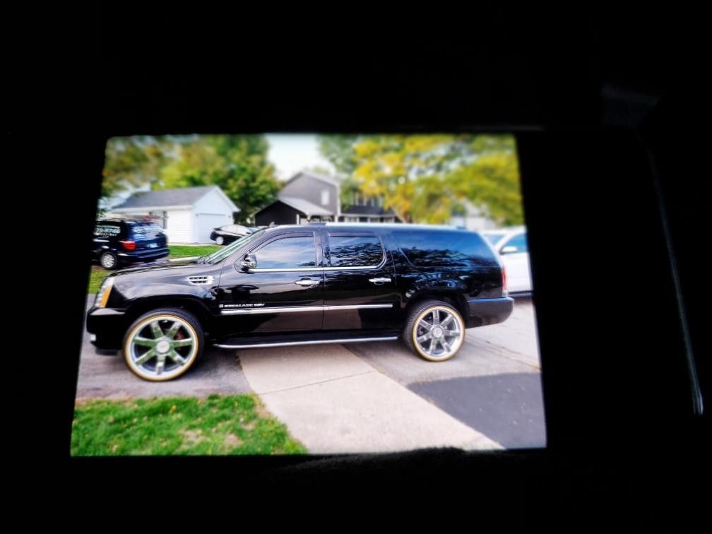 "24 oem Cadillac rims with Vouges . Rims & tires hairs still on