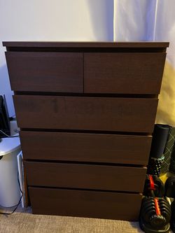 Brown tall dresser