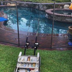 TWO (2) Spinning Rods with Reels suitable for Saltwater Fishing Plus a Plano Tackle Box with Lures,Hooks and more
