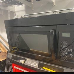 Black Over The Range Microwave. Works Fine