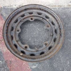 One '36-'39 Ford wide 5 Artillery wheel . 16x4 inches