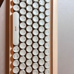 Wireless Bluetooth keyboard with mechanical backlit keys