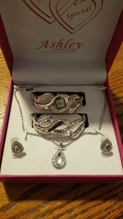 Watch, bracelet, earrings and chain