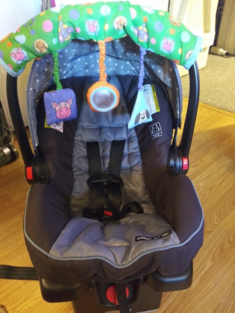 Graco car seat+ canopy and toy