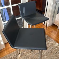 2 CB2 Bar Height Stools
