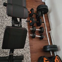 Adjustable Weight Bench And Dumbells