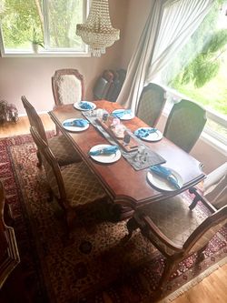 Formal dining table with buffet and hutch