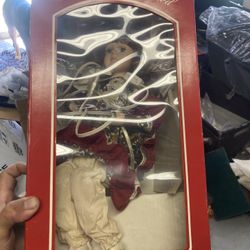 Vintage Santa’s Best Porcelain Animated Collectible Sitting Red Dress Doll 