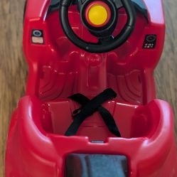 Kids push cars and ride on car with seat belt