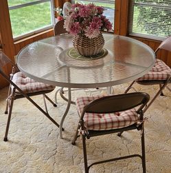 Glass table with chairs