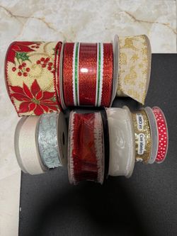 Christmas ribbon bundle of 9 plenty of cute designs some are new some opened and uses just half a yard. with red poinsettias and green holly leaves #c