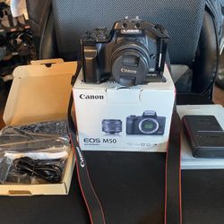 Canon EOS M50 EF-M15-45 IS STM Kit With 5 Batteries, And Cage Equipped