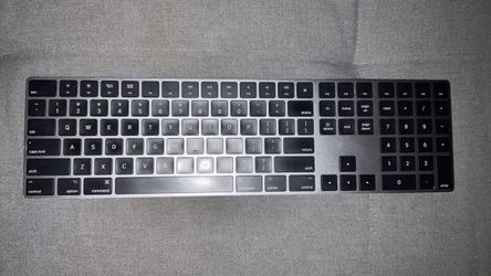Title: Apple Magic Keyboard with Numeric Keypad – Silver