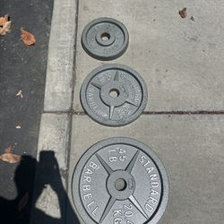 Olympic Barbell and Plates 45,35,25 (sets of two)