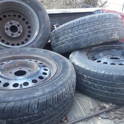 Four Tires on Chevy Malibu Wheels 225/60/16