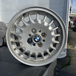 Used BMW 14” x 6 Alloy rim w/ cap, 4x100 lug set,