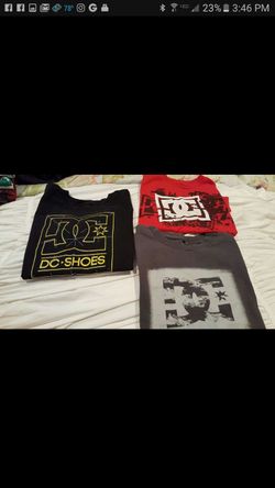 Boys DC shirts size large 5.00 takes all